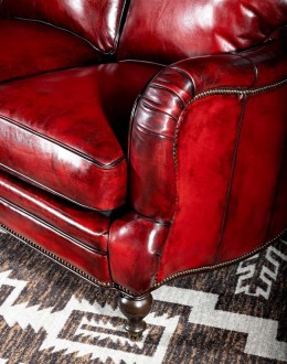 small dark red leather sofa