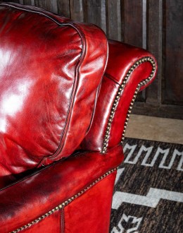 small dark red leather sofa