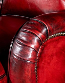 small dark red leather sofa
