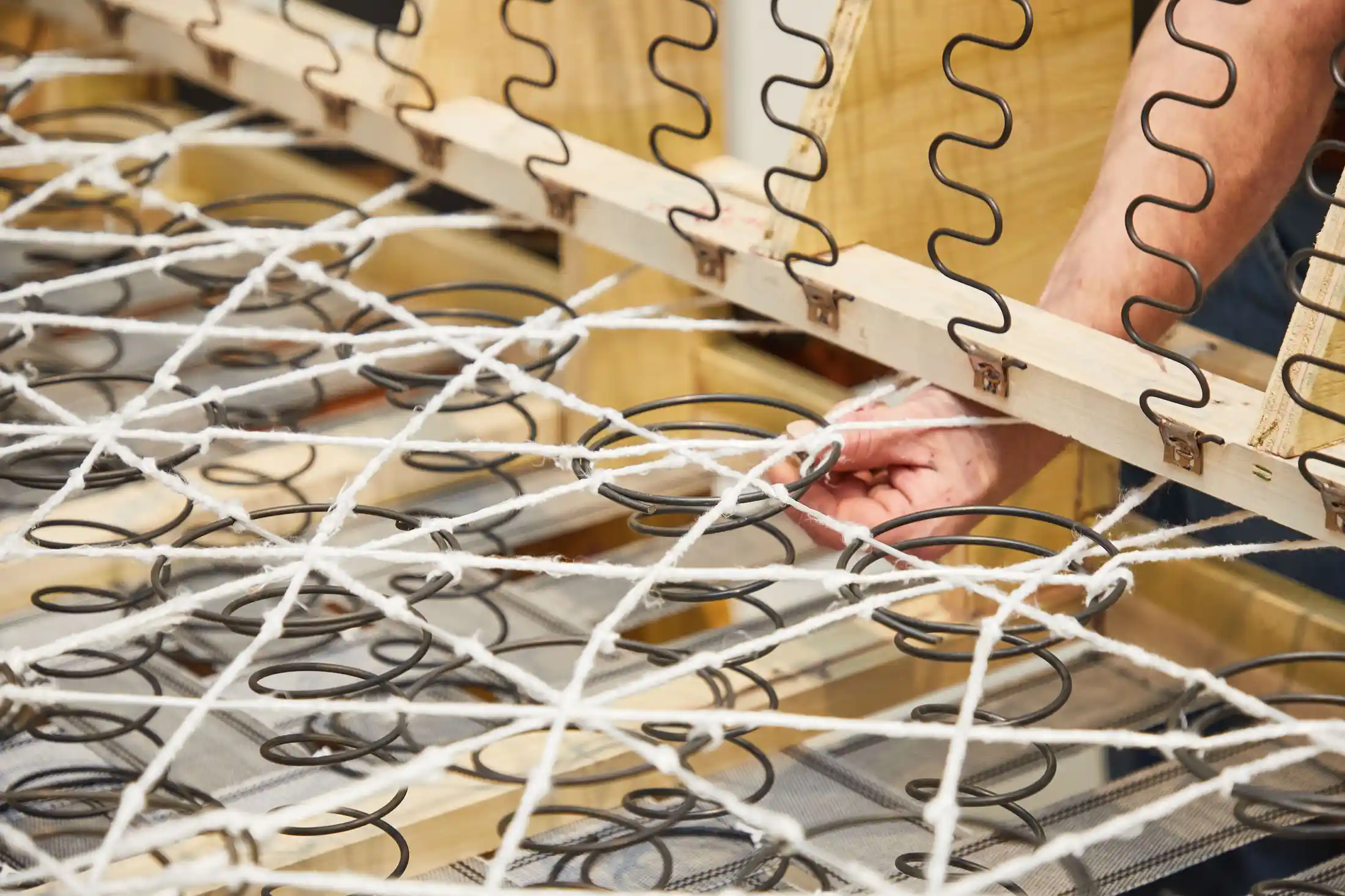 Why Eight-Way Hand-Tied Construction Still Reigns Supreme