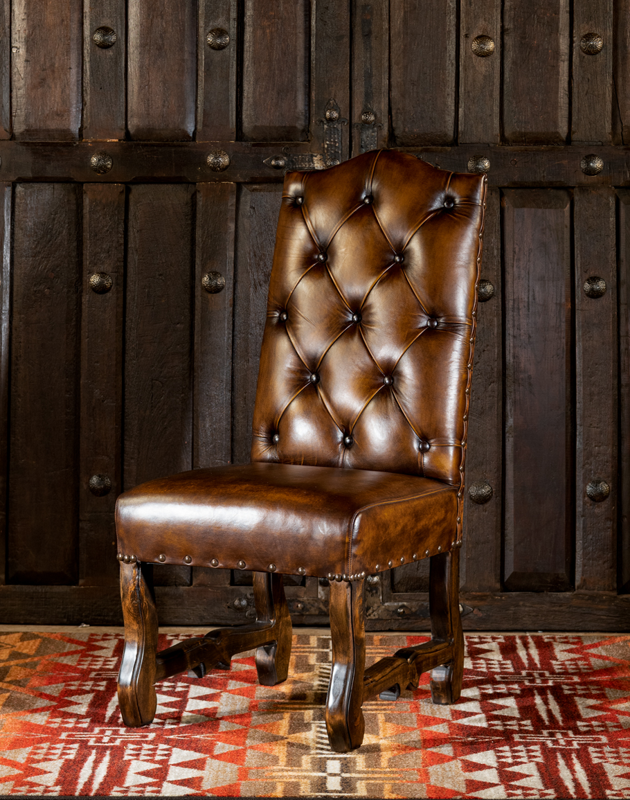 Stained and faded tufted aniline leather chair restored using Rust leather  dye. Before and after.